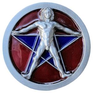 May include: A silver belt buckle with a red and blue enamel design. The design features a human figure in a star shape.