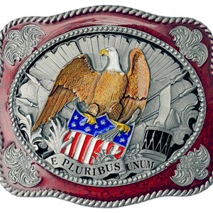 May include: A silver belt buckle with a red, white, and blue American flag, an eagle, and the words "E Pluribus Unum".