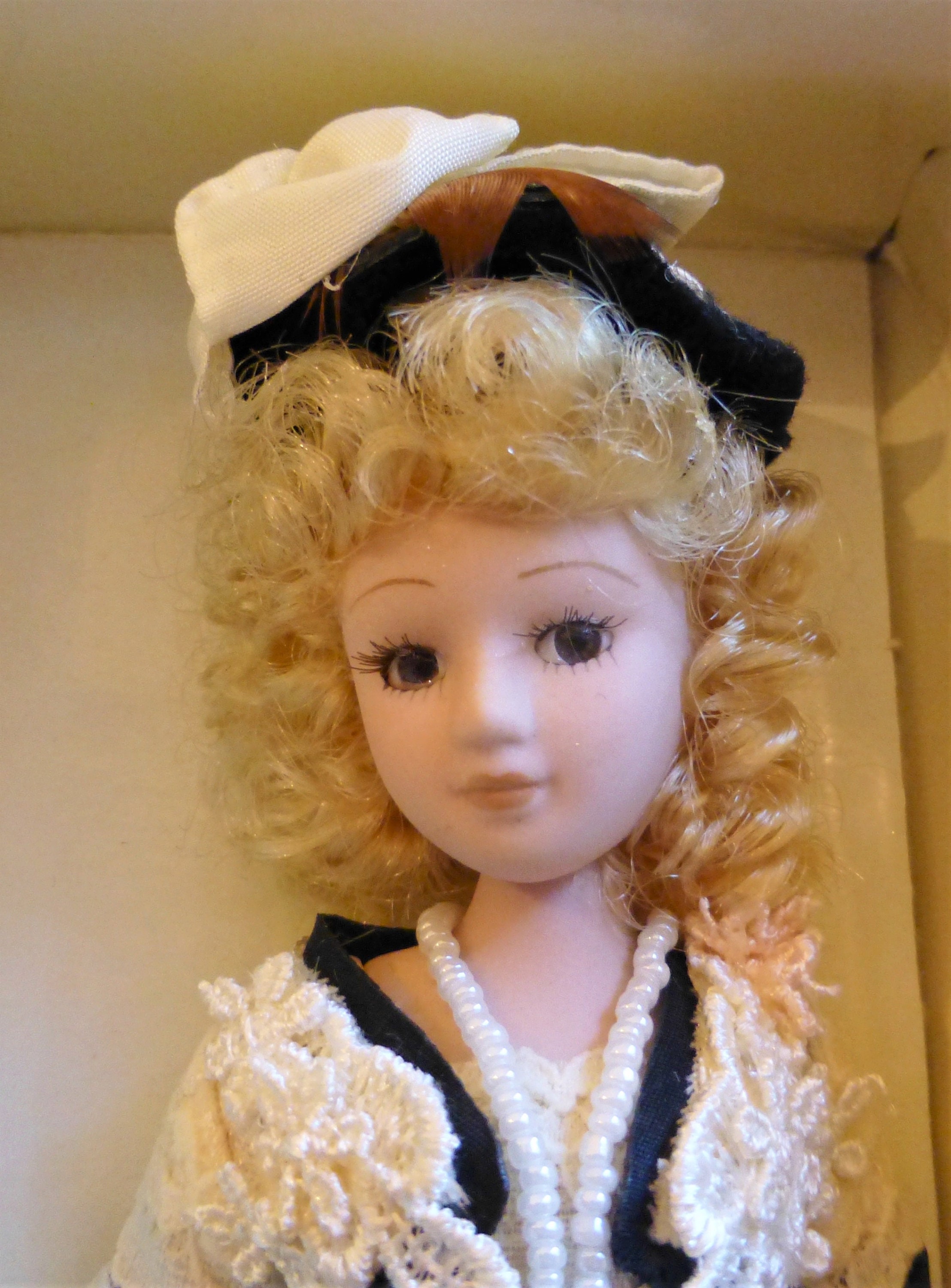 Century collection hotsell genuine porcelain doll