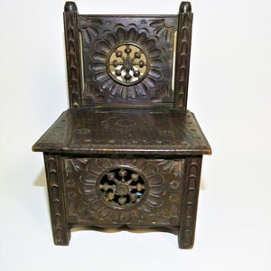 Old and beautiful chair (secret jewelry box) in carved wood. BRETON