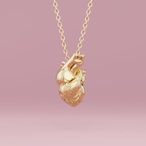 Real heart pendant in gold