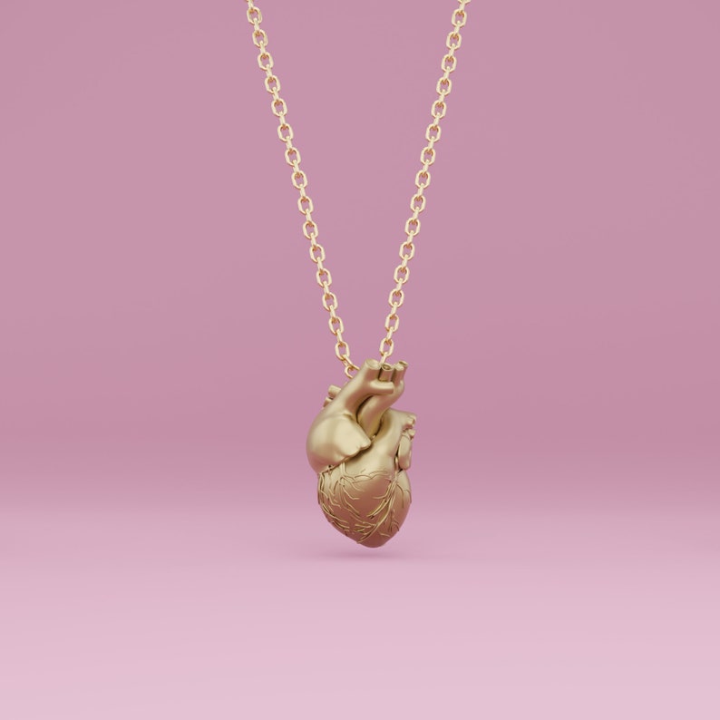 Anatomical heart pendant in brass