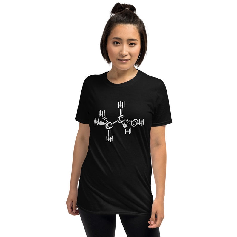 May include: A black t-shirt with a white graphic of a chemical structure. The structure is a molecule with carbon, hydrogen, and oxygen atoms.