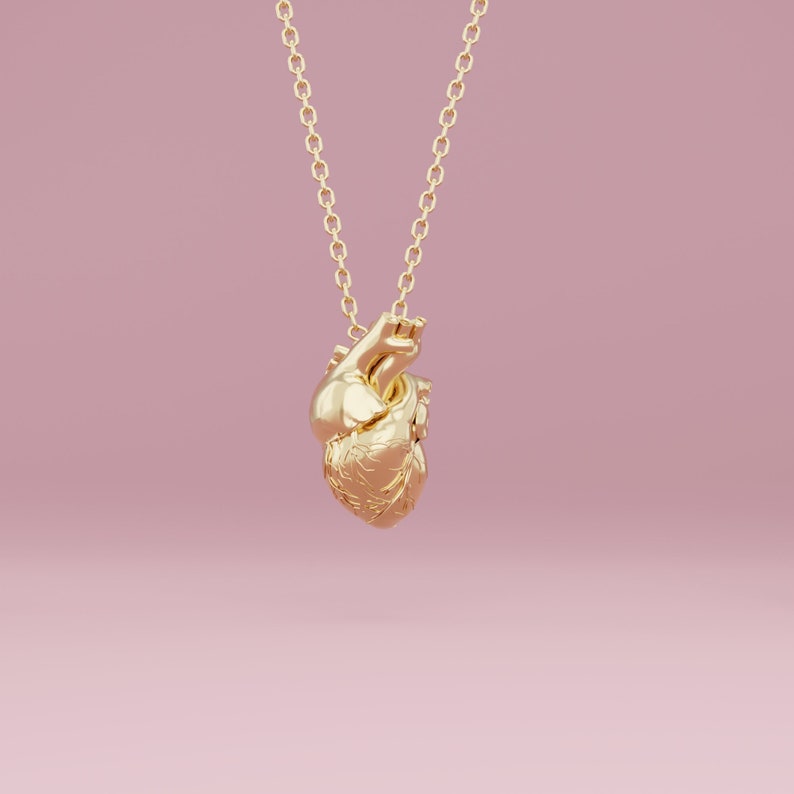 Real heart pendant in gold