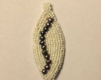 applique bead pendant