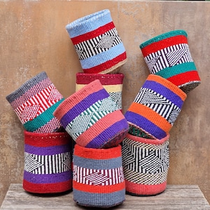 NYUZI:  6"W x 7"H Recycled wool and sisal baskets.