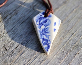 Sea pottery necklace, a beautiful one off piece with a leafy pattern, on a waxed brown cord which is adjustable