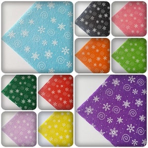 May include: Assortment of felt sheets with a snowflake and swirl pattern in various colours, including blue, black, pink, orange, green, red, purple, yellow, and light purple.