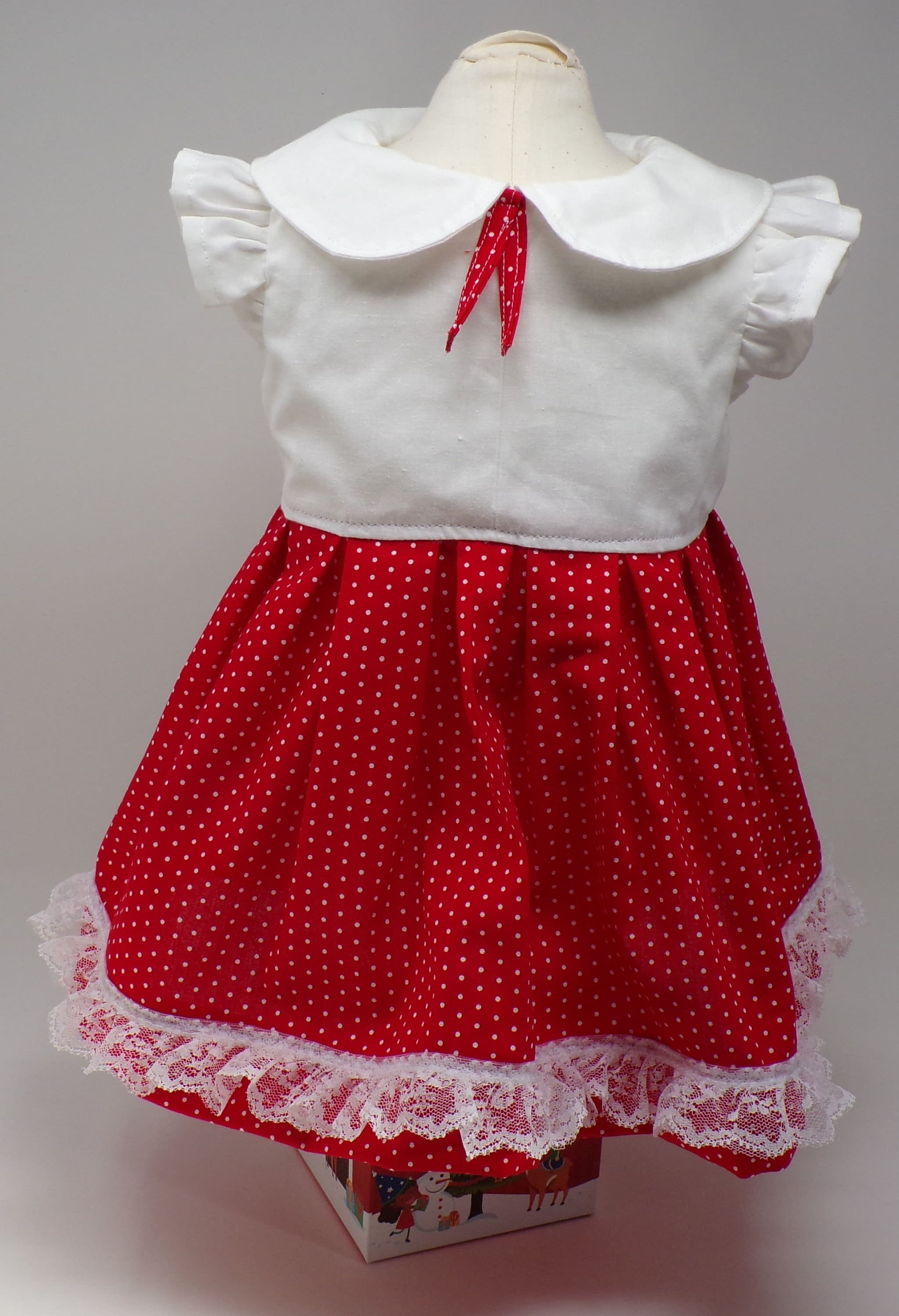 red frock with white dots