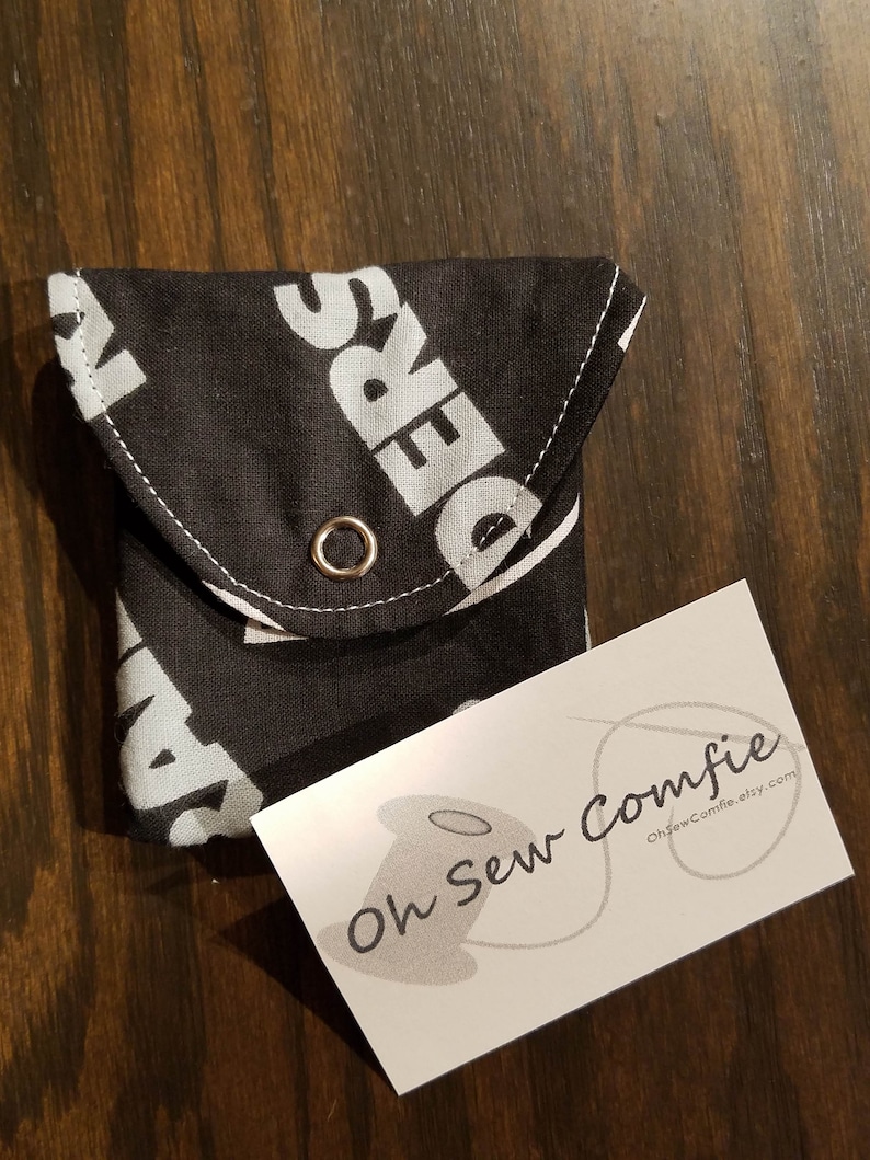 Raiders with a Solid Black Interior Rosary Coin Fabric Purse with Metal Snap Closure