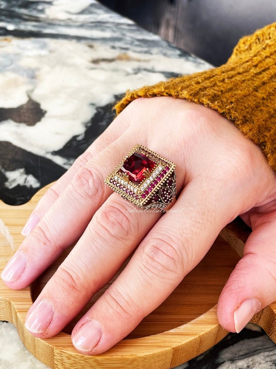 Red stone 2024 ring for ladies