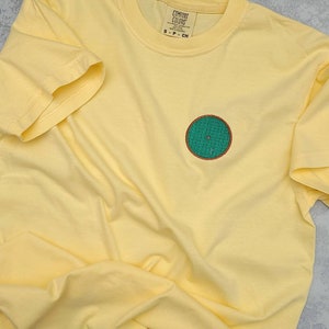 In a Hole in the Ground | embroidered unisex t-shirt