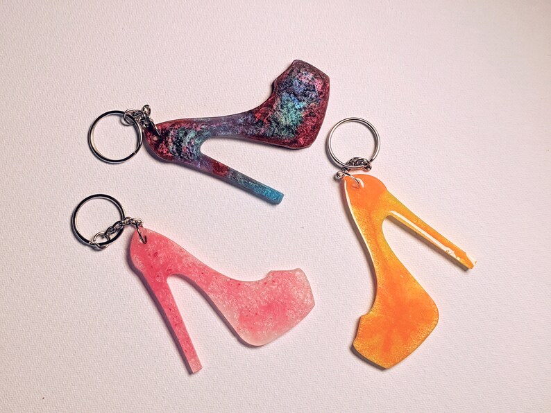A fun coulorful high heel resin shoe keychain Functional Art that can be taken with you.