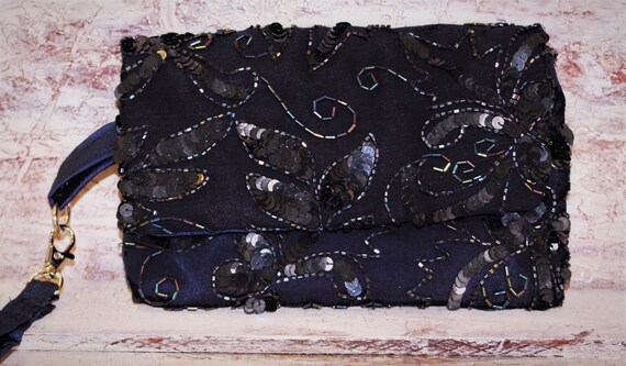 navy blue beaded clutch bag