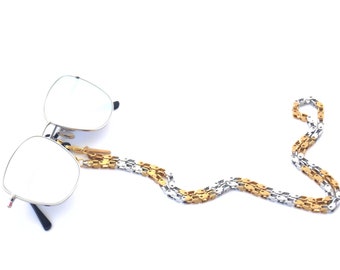 Cadena para gafas de bicicleta de dos tonos, de acero inoxidable, unisex, dorada y plateada.