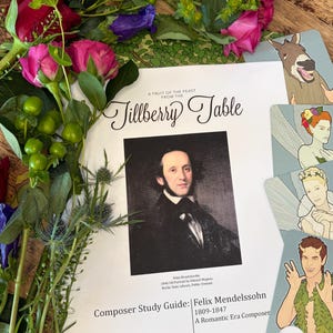 May include: A still life arrangement featuring a study guide titled "Tillberry Table" with a portrait of Felix Mendelssohn. The guide is surrounded by fresh flowers in shades of pink, red, and green, and illustrated cards.
