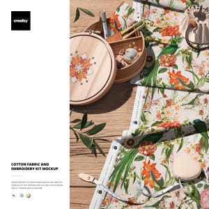 May include: A wooden embroidery hoop with a cross-stitch design, a small wooden box with sewing supplies, and floral fabric with a measuring tape. The image also includes the text "COTTON FABRIC AND EMBROIDERY KIT MOCKUP".
