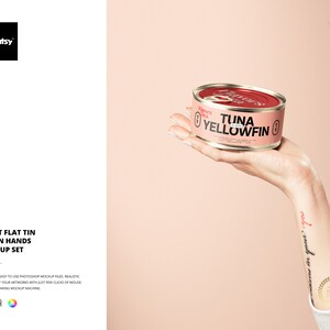 May include: A hand holding a pink can of tuna labeled "Tuna Yellowfin".
