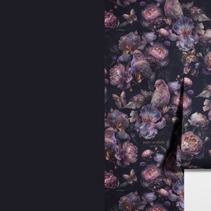 May include: A dark purple floral wallpaper with a repeating pattern of flowers, birds, and butterflies. The wallpaper has a vintage aesthetic and is perfect for adding a touch of elegance to any room.