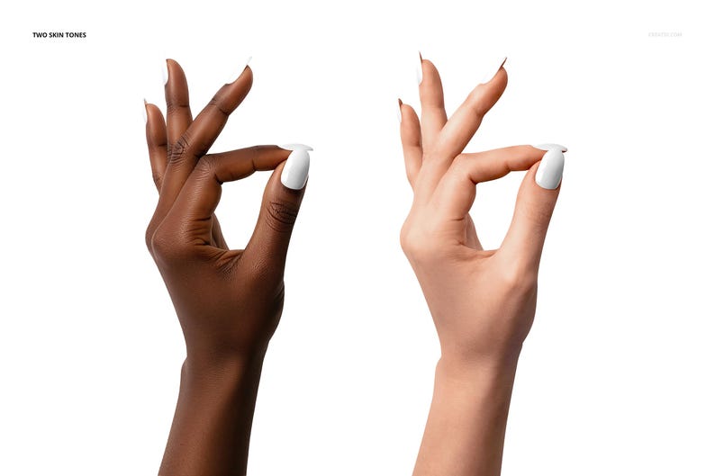 May include: Two hands, one dark and one light, each making an 'okay' sign with white nail polish. The image is on a white background, with the text "TWO SKIN TONES" in the upper left corner. The nails are long and pointed.