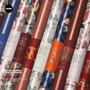 May include: An assortment of wrapping paper rolls with diverse patterns, such as floral, striped, and checkered designs. The rolls display the text "Wrap Paper" and "Merry Christmas". The colour scheme incorporates red, blue, white, and gold.