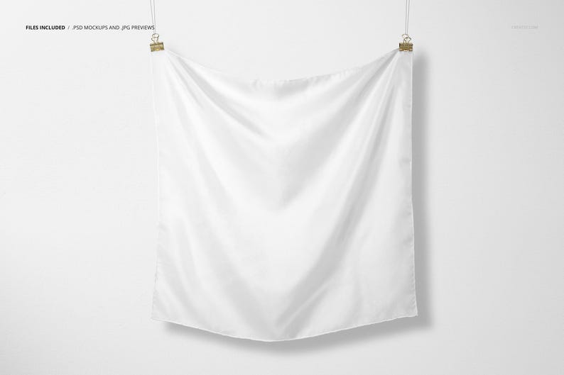 May include: A white fabric square hanging from two clips against a white background.