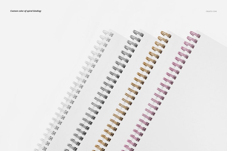 May include: Four spiral bound notebooks with different colored binding coils. The coils are silver, gold, pink, and black.
