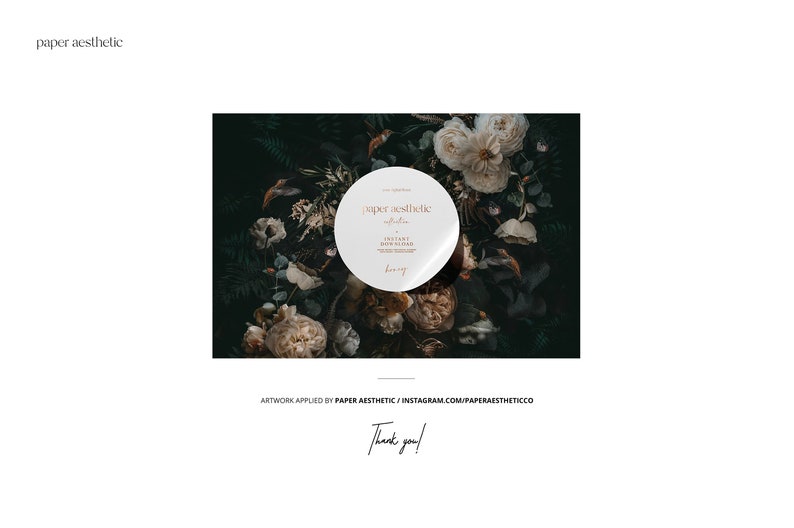 May include: A white circle sticker with the text "paper aesthetic" in a brown font. The sticker is placed on a dark green background with white and brown flowers.