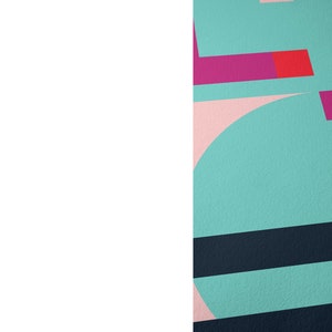 May include: Abstract geometric design with pink, red, teal, and black shapes. The design features a curved shape and overlapping rectangles.