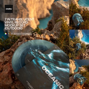 May include: A mockup set of 7-inch translucent vinyl records with a blue and white marbled design. The album cover features the word "OCEANIC" in white. The image is set outdoors with a rocky background and ocean view.