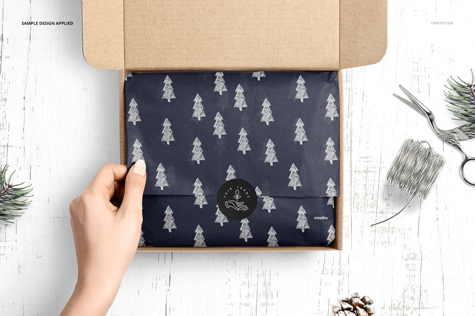 Placeit - Wrapping Paper Mockup with Scissors and Gift Items Above