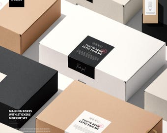 May include: An assortment of mailing boxes in various colors, including white, black, and tan. Each box features a sticker with the text "YOU'VE BEEN EXPECTING ME" and "Thank you!". The boxes are arranged in a mockup set.