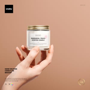 Hand Holding Candle Jar Mockup