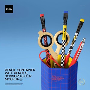 May include: A blue pencil container with pencils, scissors, and a clip. The container has a grid pattern. The pencils have red, yellow, and black accents. The scissors are gold-colored. The text on the container reads "Pencil Container with Pencils, Scissors & Clip Mockup."