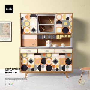 May include: A mid-century modern kitchen cupboard mockup with a geometric pattern in orange, black, gray, and yellow. The cupboard has drawers, shelves, and a display area. The text "KITCHEN CUPBOARD MOCKUP PART 5 OF FF.13" is visible.