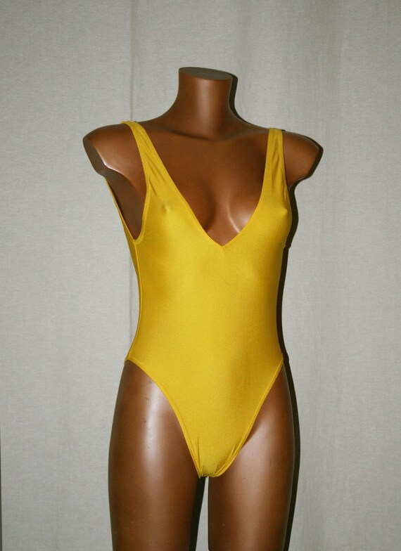 Vintage yellow swimsuits/ bodysuits/costumes/ sexy