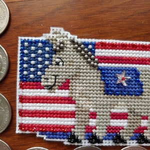 Patriotic Blue: Donkey in fount of an American flag