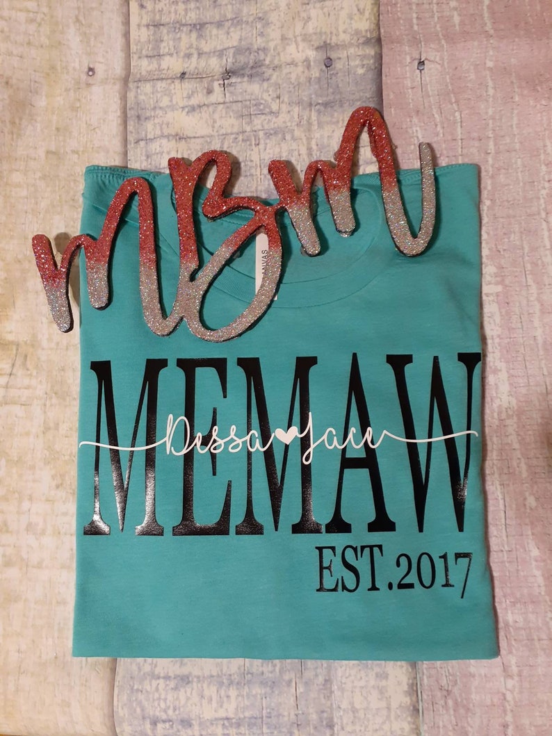 Download MOM est shirt with kids name . Also done for Nana Grandma ...