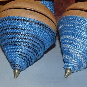 Hand-decorated wooden spinning top, 11 cm