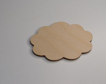 Puede incluir: Un recorte de madera en forma de nube, perfecto para manualidades o decoración.