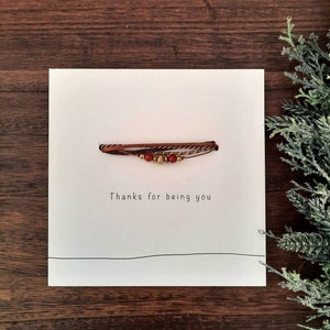 Mooie armband bruintinten met kralen. 'Thanks for being you'