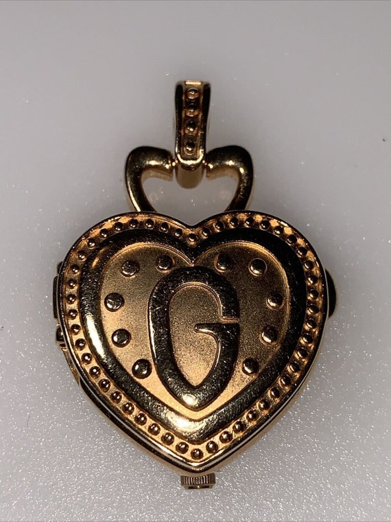 Guess deals watch heart