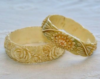Vintage 1930s Art Deco set of 2 white carved floral early plastic bangle bracelets