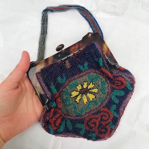 Antique 1920s, beautiful vibrant hand beaded evening bag , floral design, with celluloid handle.