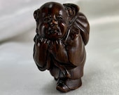 Vintage Japan Ebony Ironwood Netsuke Man Walking and Carrying Sack Signed
