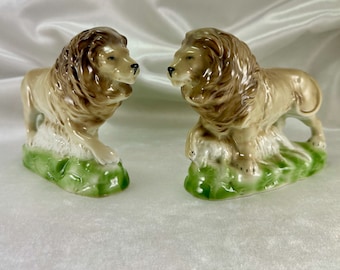 Vintage Germany Porcelain Pair of Lions with Hunted Goat Figurines