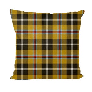 May include: A yellow, black, white, red, and blue plaid throw pillow. The pillow is made of a soft, woven fabric.
