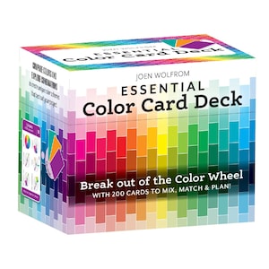 May include: A box of color cards with the title "Essential Color Card Deck" and the text "Break out of the Color Wheel with 200 cards to mix, match & plan!" The box is decorated with a rainbow pattern of colored squares.