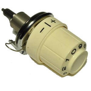 May include: A cream-colored cylindrical control knob featuring a black printed scale with numbers 0 through 9 and a plus and minus symbol. The knob is attached to a metallic threaded shaft with a grooved tip and a thin wire spring component.