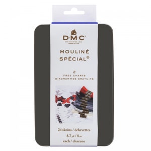 May include: A black metal tin with a white label containing 24 skeins of DMC Mouline Special embroidery floss. The label reads "2 Free Charts, Diagrammes Gratuits, 24 skeins/échevettes, 8.7 yd/8 m each/chacune".